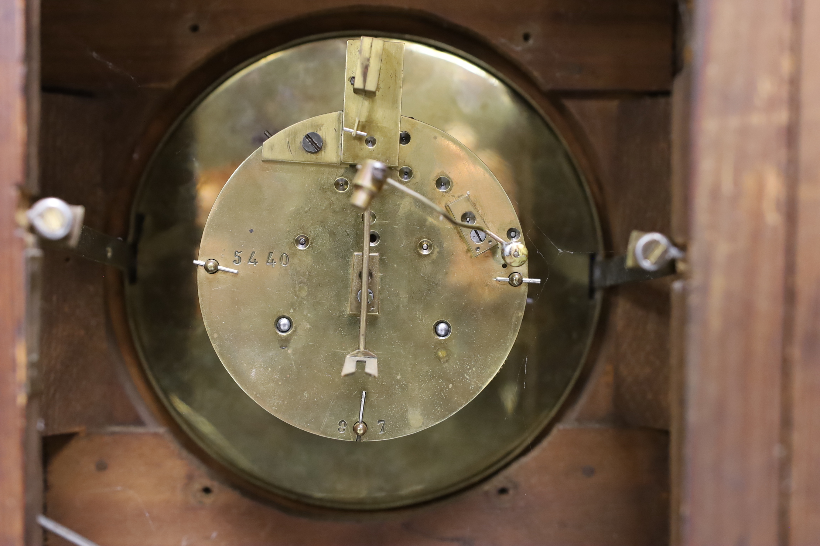 A late 19th century mahogany mantel clock with ebonised dial, 37cm